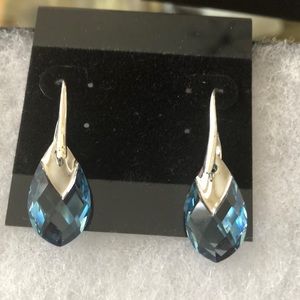 Swarovski crystals and silver tone earrings.